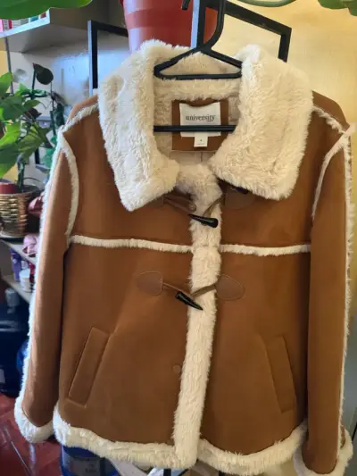 Chaqueta de invierno con forro de piel sintética - miniatura 1