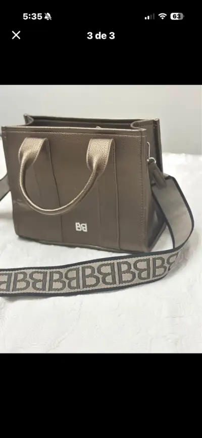 Bolso de mano marrón con correa ajustable - miniatura 1