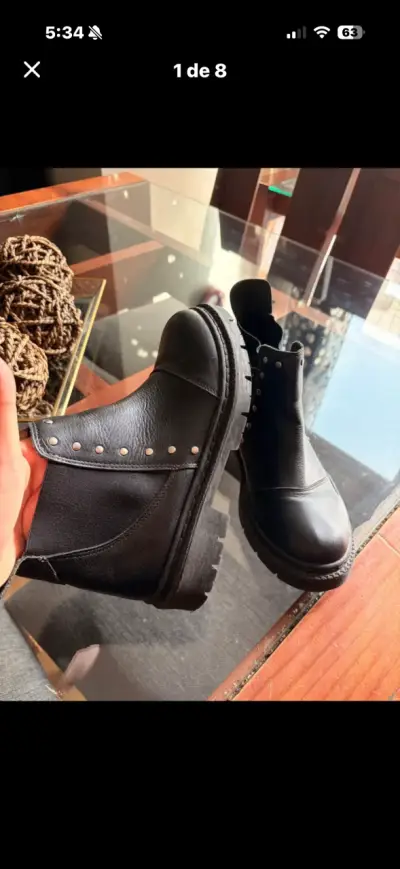 Botines negros de cuero con tachas - miniatura 1
