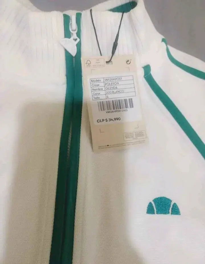 Chaqueta deportiva blanca con detalles verdes - 1