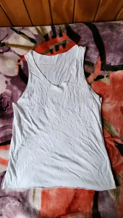 Polera sin mangas blanca para mujer - miniatura 1