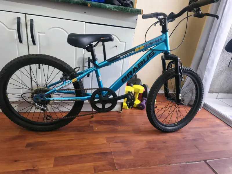 Bicicleta de montaña azul con suspensión - 5