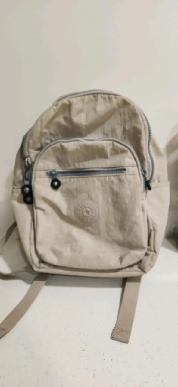 Mochila Kipling beige de lona