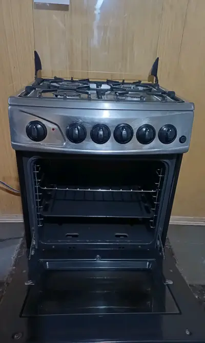 Cocina a gas de 4 quemadores con horno - miniatura 5