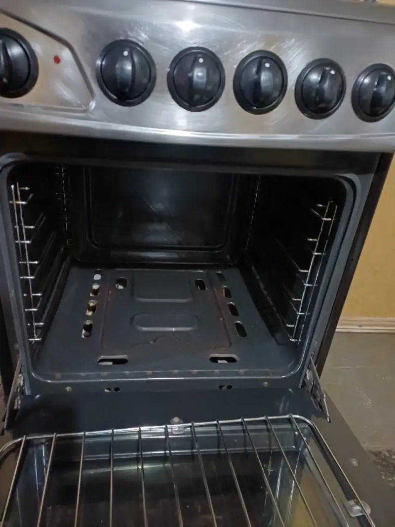 Cocina a gas de 4 quemadores con horno - 6