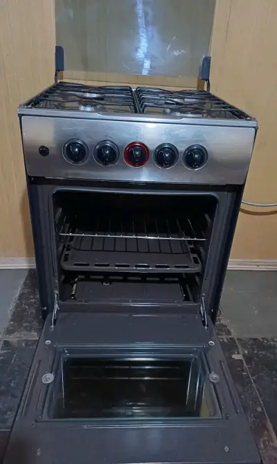 Cocina a gas de 4 quemadores con horno - miniatura 2