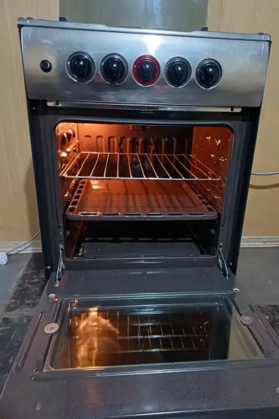 Cocina a gas de 4 quemadores con horno - miniatura 5