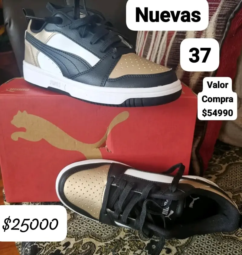 Zapatillas deportivas Puma negras y doradas talla 37