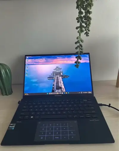Notebook ASUS Zenbook Q409Z i5 256GB QLED 2.8K - miniatura 1
