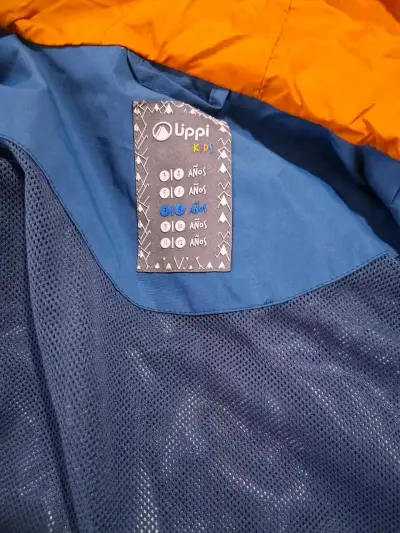 Chaqueta impermeable azul para niños Uppí - miniatura 3