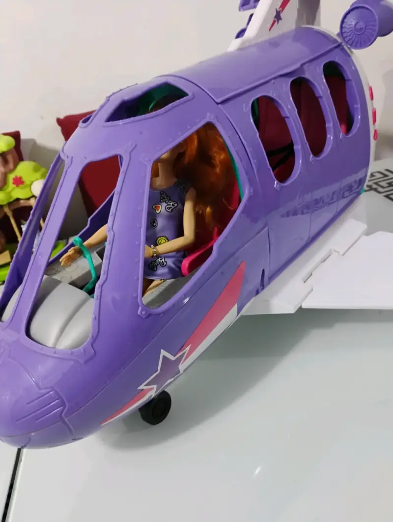 Avión de juguete morado con muñeca incluida - 2