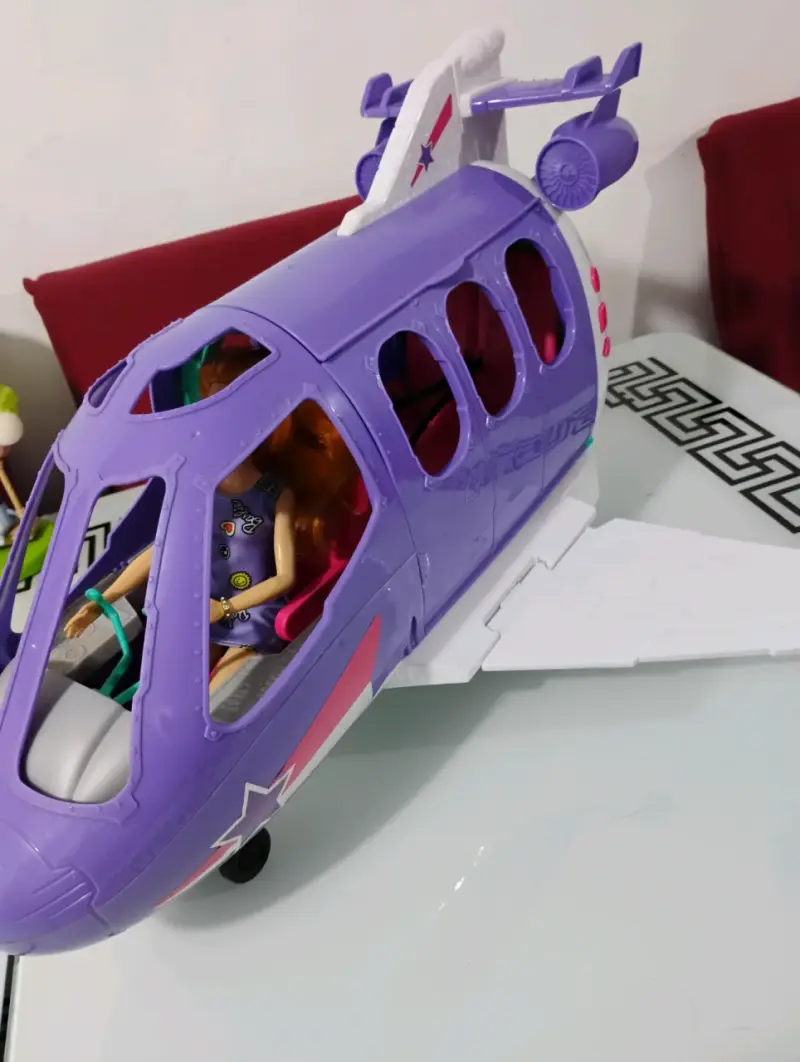Avión de juguete morado con muñeca incluida - 4