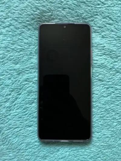 Smartphone Motorola naranjo en buen estado - miniatura 1
