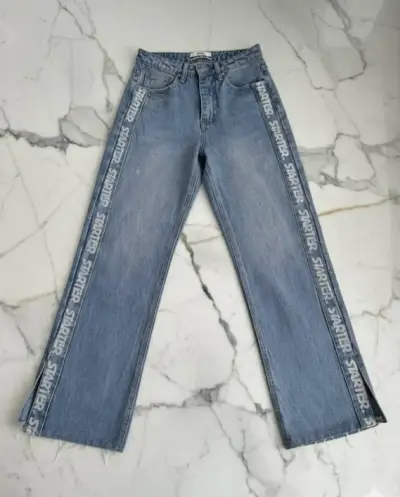 Jeans azules con logo lateral Starter - miniatura 1
