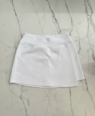 Falda corta blanca de algodón para mujer - miniatura 1