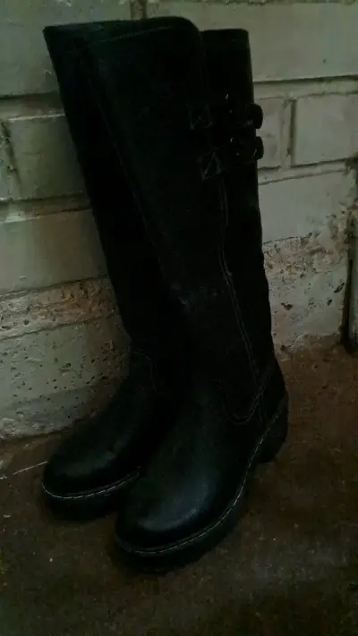 Botas negras de cuero para mujer - miniatura 1