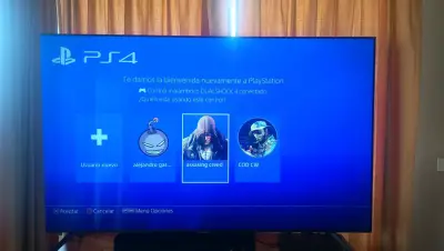 Consola PlayStation 4 con dos controles y juegos - miniatura 2