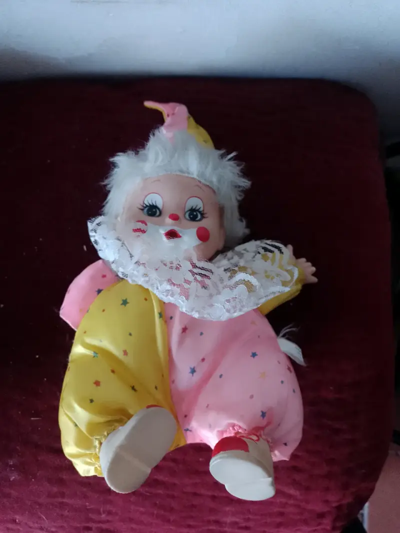 Payaso musical de tela colorido