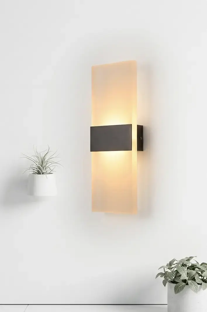 Aplique de pared moderno con luz cálida