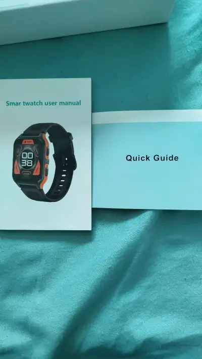 Smartwatch deportivo negro y naranja con funciones avanzadas - miniatura 3