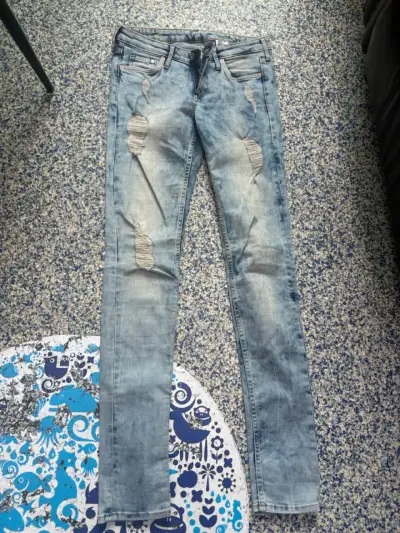 Jeans skinny desgastados para mujer H&M - miniatura 1