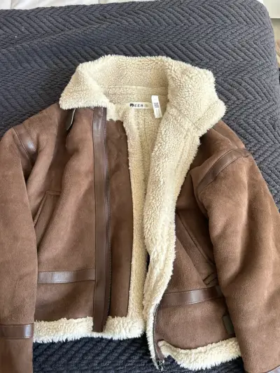 Chaqueta de cuero sintético con forro de lana - miniatura 1