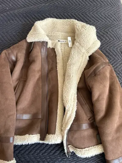 Chaqueta de cuero sintético con forro de lana - miniatura 2