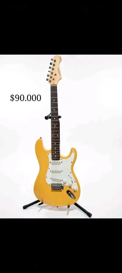 Guitarra eléctrica amarilla tipo Stratocaster - miniatura 1