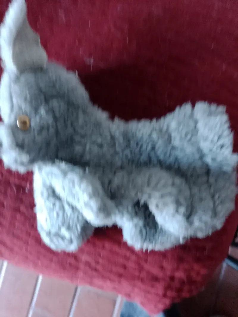 Títere de mano perro gris suave