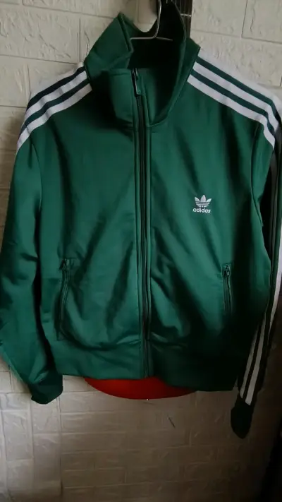 Chaqueta deportiva verde Adidas con logo - miniatura 1