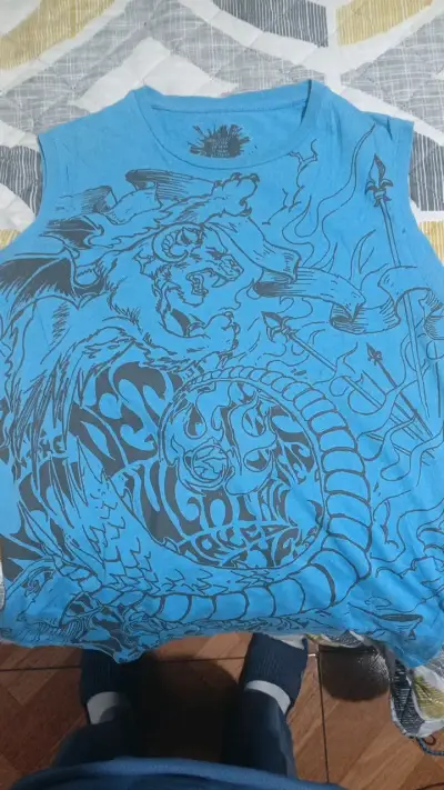 Polera sin mangas azul con diseño gráfico H&M - miniatura 1