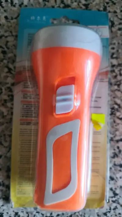 Linterna LED recargable naranja - miniatura 1