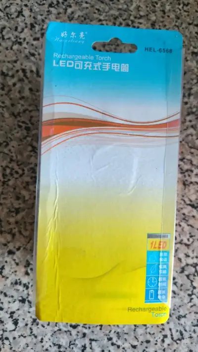 Linterna LED recargable naranja - miniatura 2