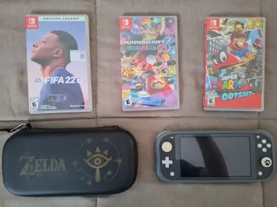 Nintendo Switch Lite con juegos FIFA 22, Mario Kart 8 y Super Mario Odyssey - miniatura 1