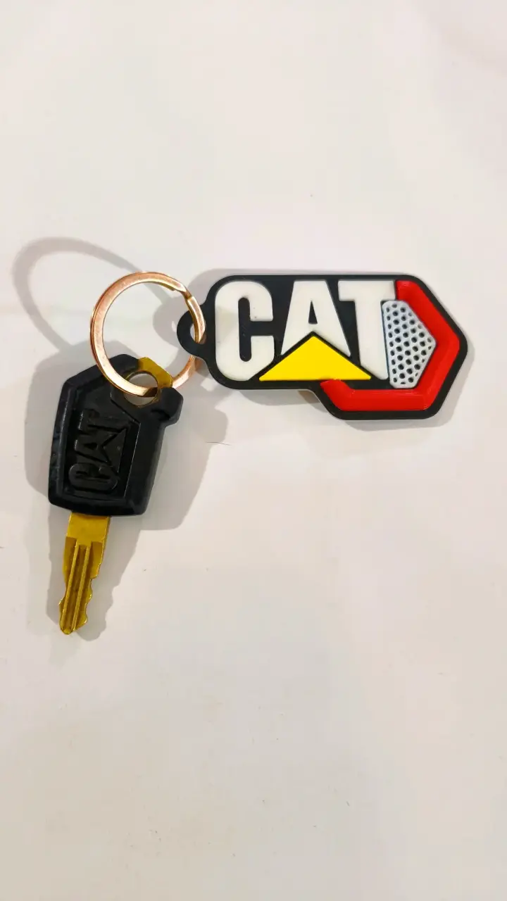 Llavero + llave CAT para maquinaria