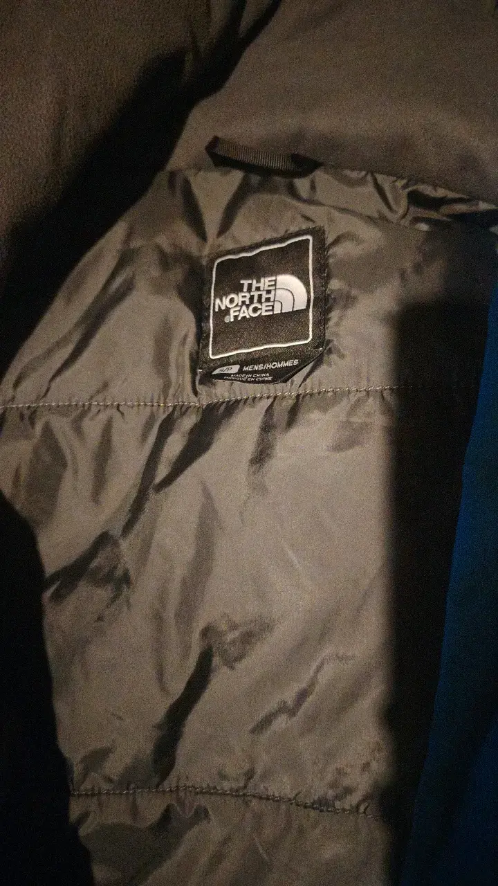 Chaqueta impermeable The North Face azul y negra - 2