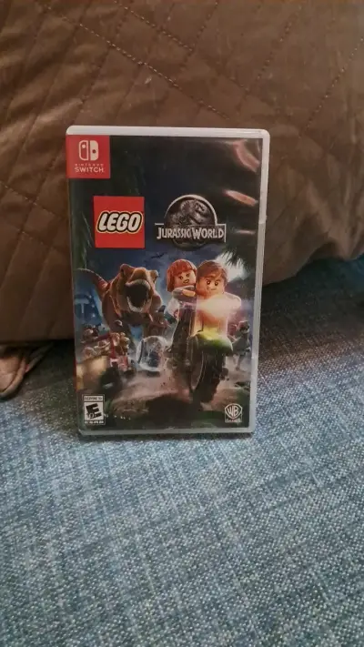 Juego Nintendo Switch LEGO Jurassic World - miniatura 1