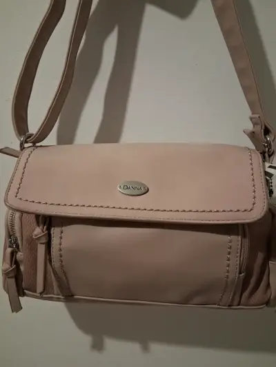 Cartera rosa Danna con múltiples bolsillos - miniatura 1