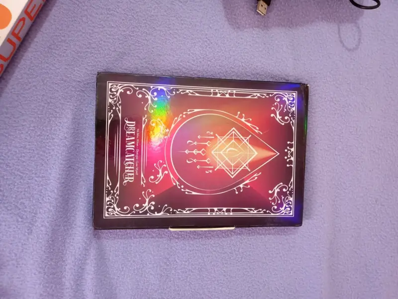 Álbum Dreamcatcher con diseño místico - 1