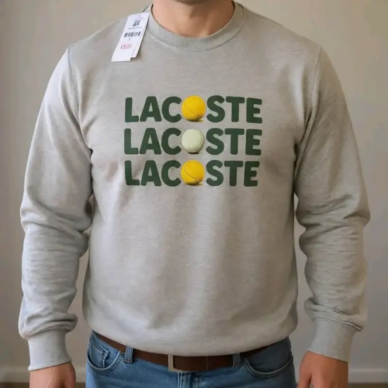 Polerón gris Lacoste con diseño de pelota TALLA XL