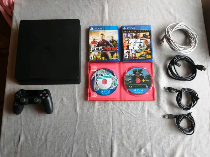 Consola PS4 con juegos y accesorios - 1