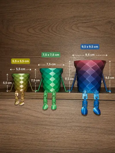 Maceteros decorativos con diseño colorido y patas - miniatura 1