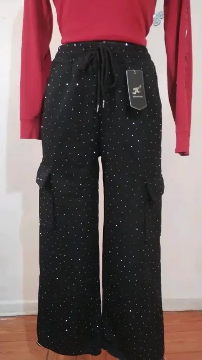 Pantalones negros con brillo y bolsillos conjuntos - miniatura 1