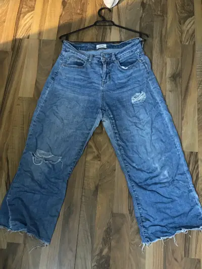 Jeans anchos desgastados para mujer - miniatura 1