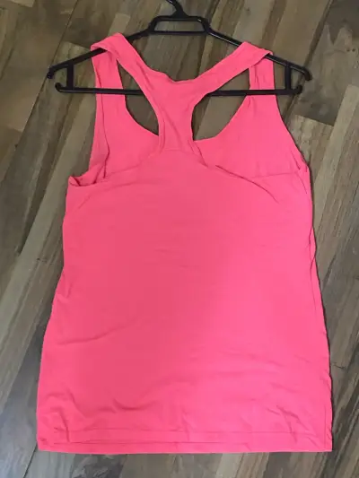 Polera deportiva rosada para mujer - miniatura 2
