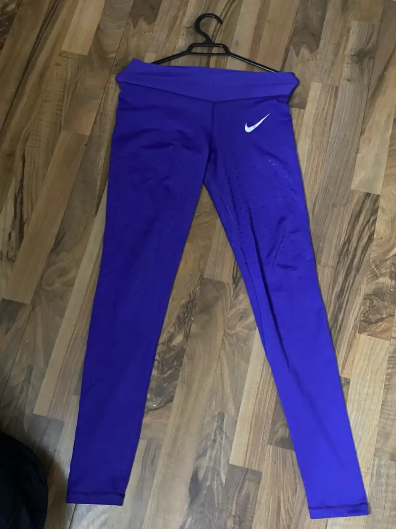 Leggings deportivos morados Nike para mujer - 1