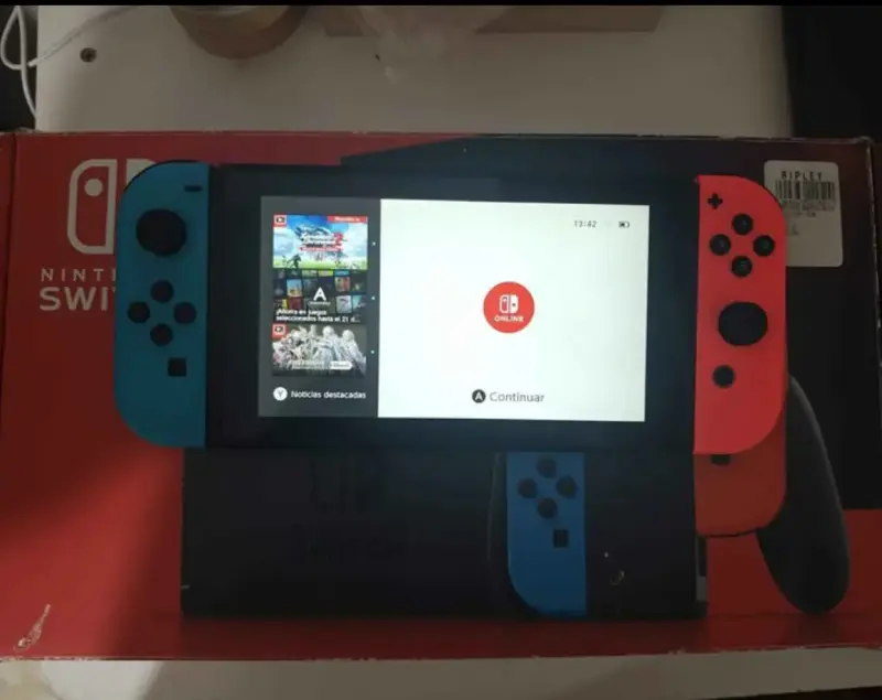 Consola Nintendo Switch con Joy-Con Azul y Rojo - 1