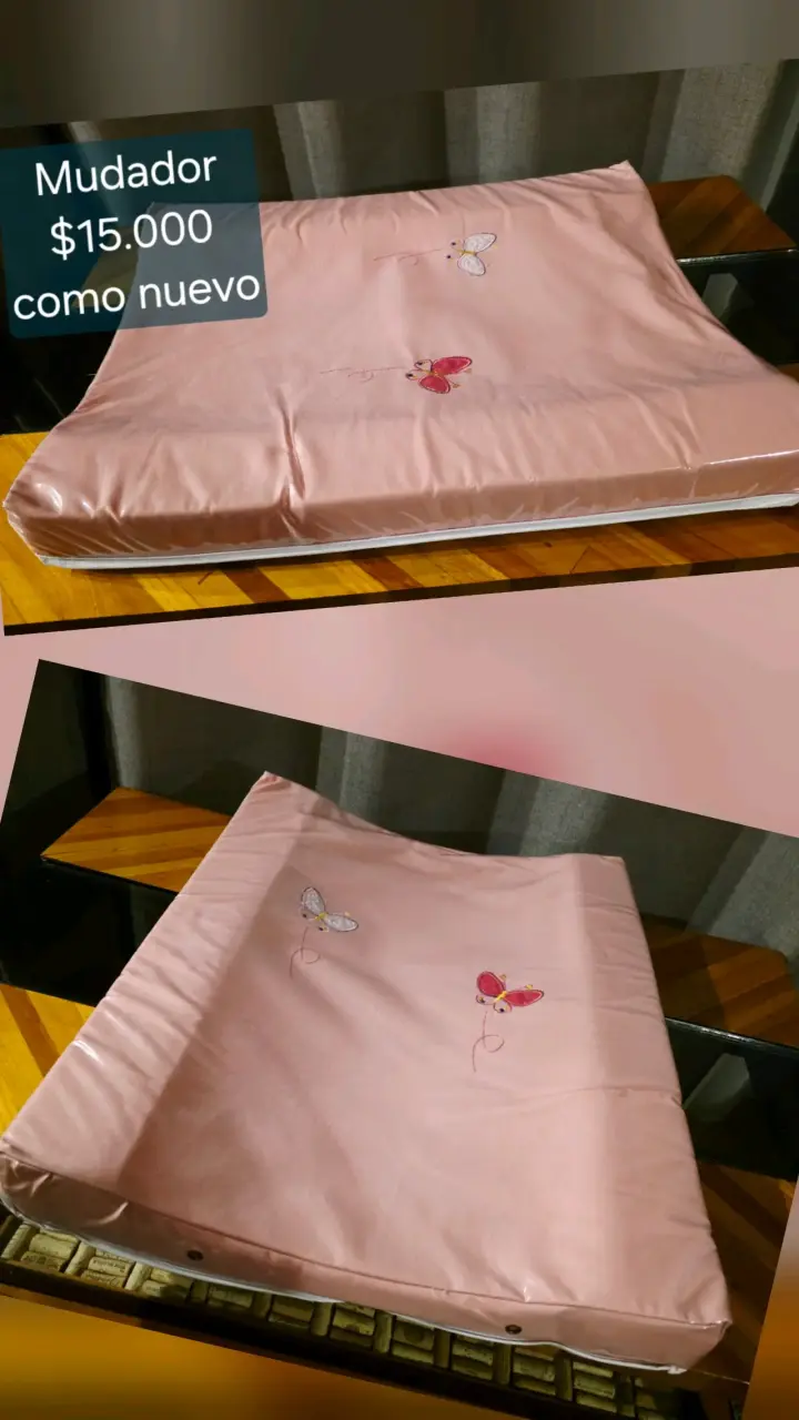 Mudador de bebé rosa con mariposas