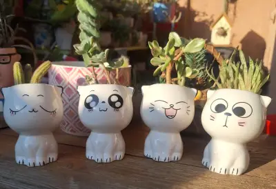 Macetero de cerámica con diseño de gato - miniatura 1