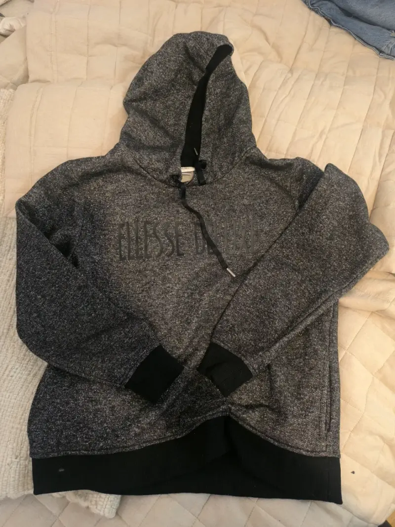 Polerón negro con brillo